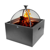Outdoor fire pit with burning wood and a metal cover on a white background