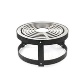 Round metal fire pit grill with concentric circular design on a white background