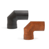 Black and rust-colored elbow-shaped metal pipe fittings on a white background