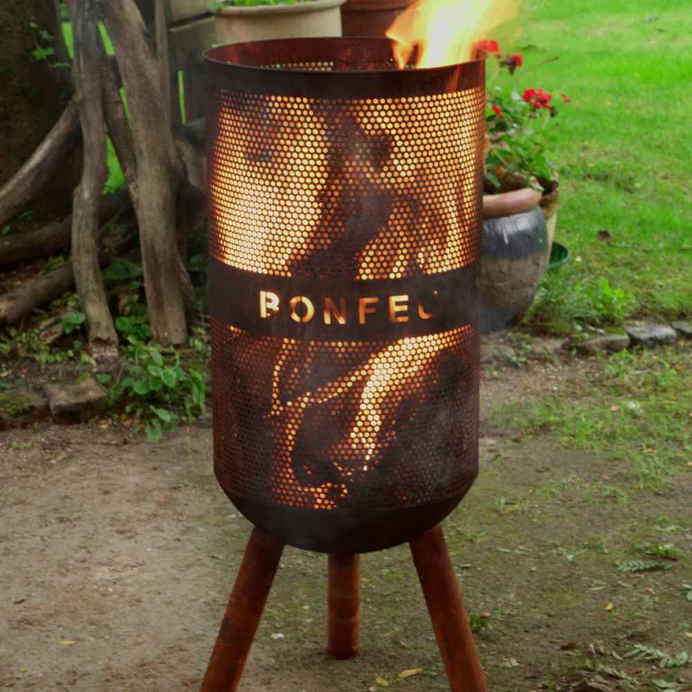 Outdoor fire pit with 'Bonfeel' branding on a grassy area