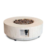 Round fire pit table with wooden exterior and visible gas valve on a white background
