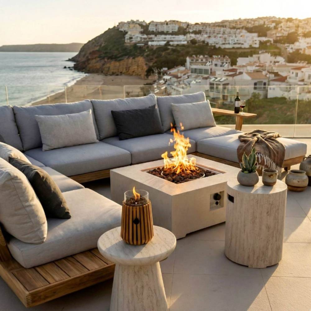 Outdoor patio with sectional sofa, fire pit, and ocean view