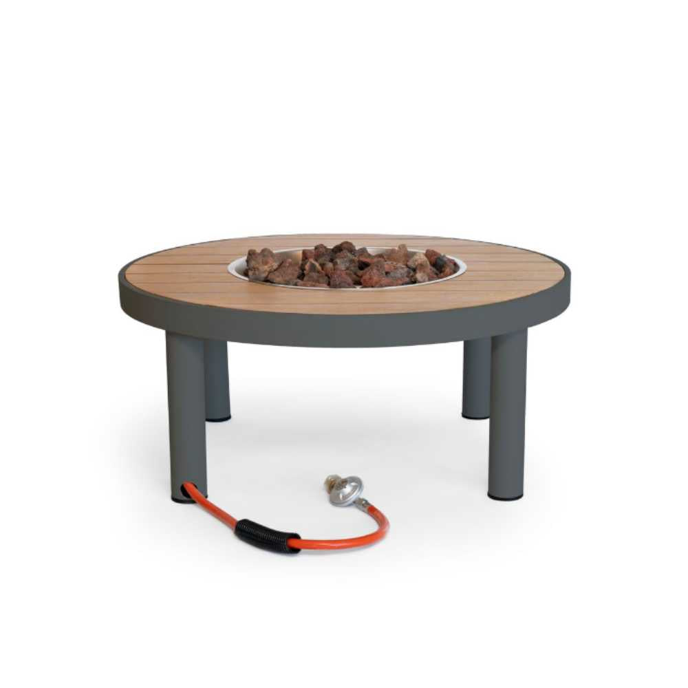 Round fire pit table with wooden top and gray base on a white background