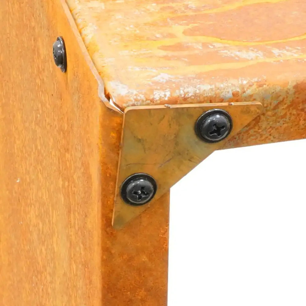 Close-up of a metal bracket on a wooden surface with visible rust.