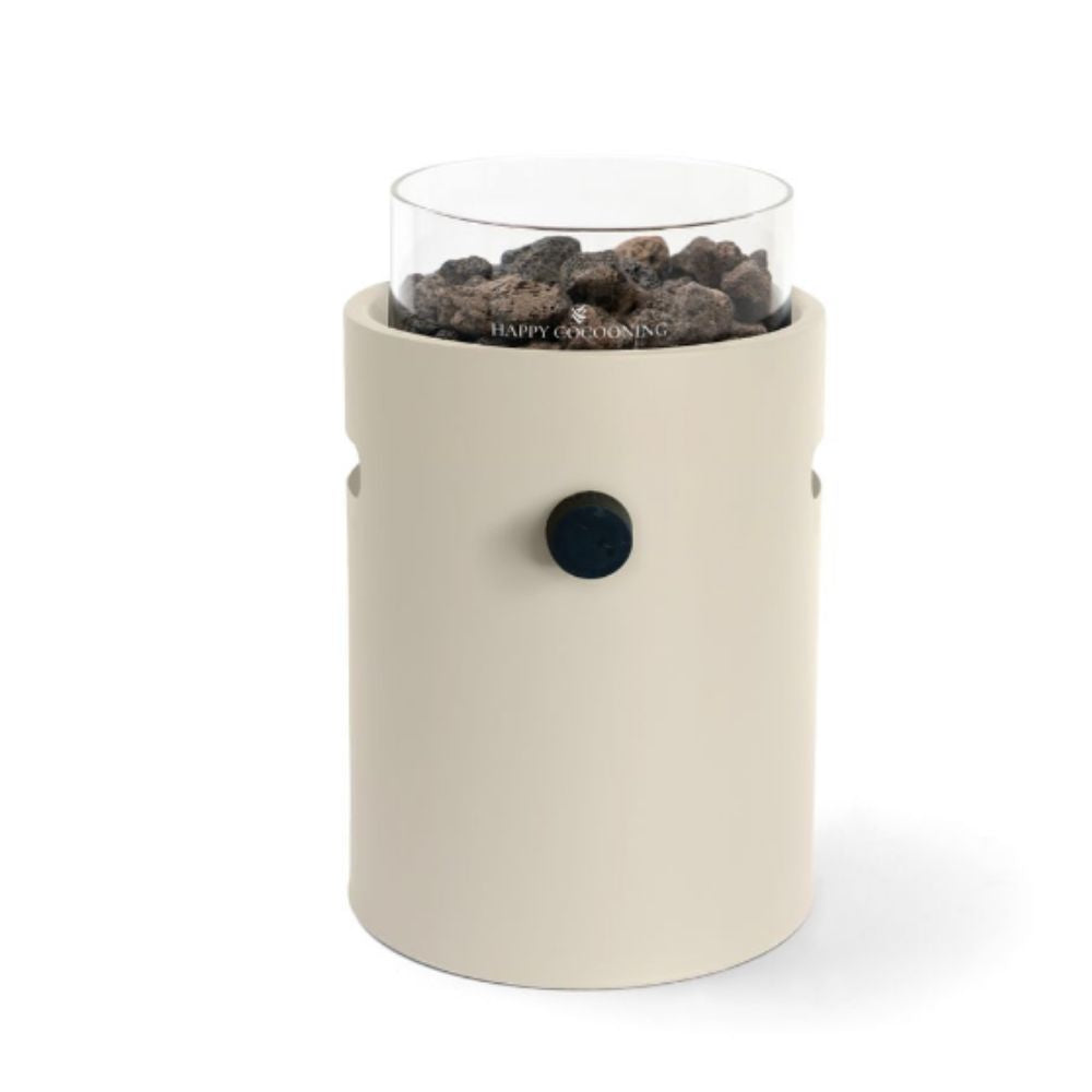 Cylindrical table top burner with glass top and beige base on a white background