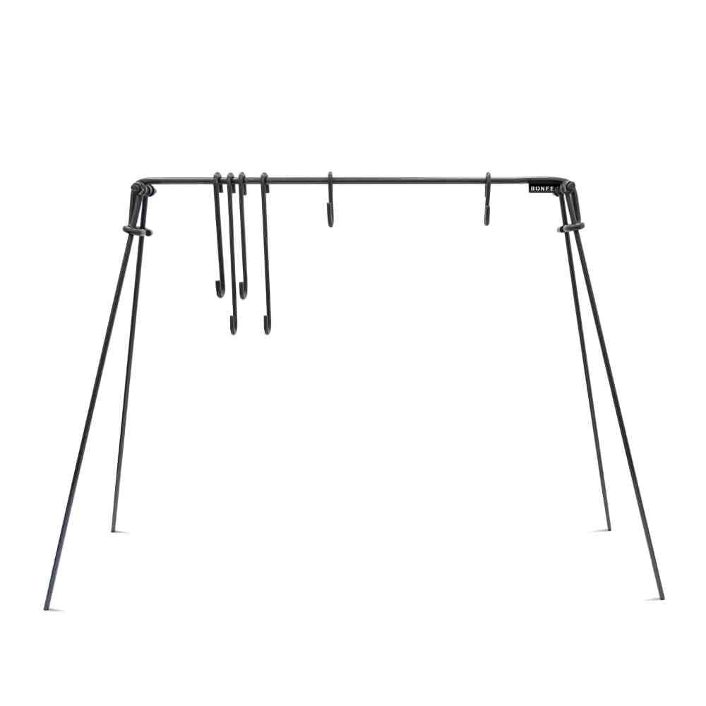 Black metal swing set frame on a white background